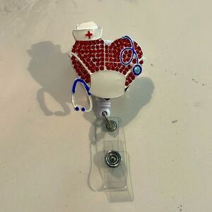 Retractable badge reel with bedazzled ❤️ with mask and stethoscope. New
